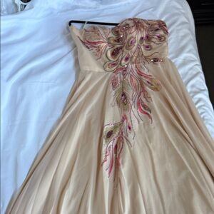 Strapless Cream Evening Gown with Embroidered Peacock Accent